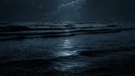 A dark ocean scene with gentle waves illuminated by moonlight, surrounded by cloudy skies.